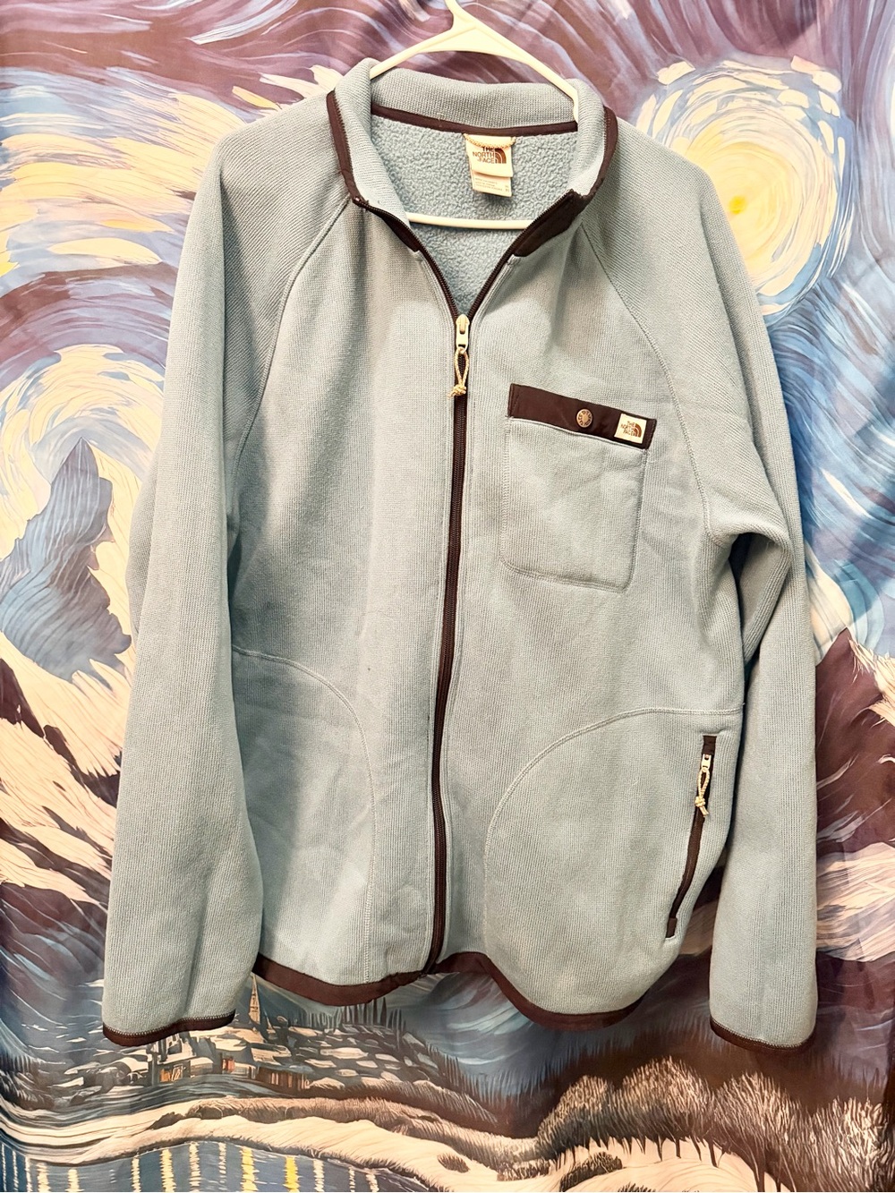 The North Face Light Blue Fleece Jacket with Black Trim Accents